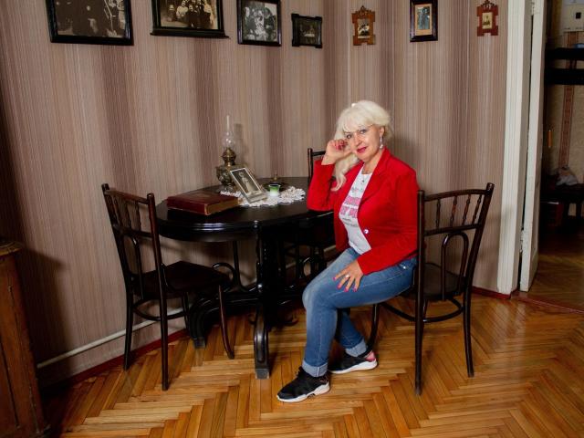 Coat of arms with a red and white shield, black cross, and red letters "Z" in the upper right. Simple, bold design. Flat colors, minimal shading. KamaliaSim not present.