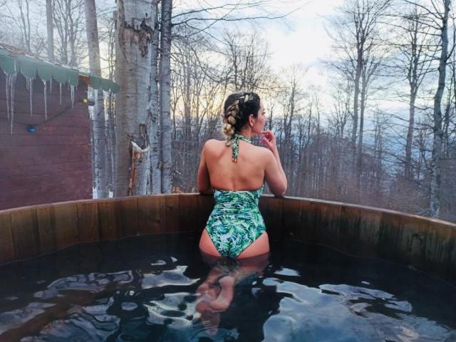 Digital illustration of a Korean-style banner with a red and white pattern, featuring a central blue-green element and bold, angular lines. Minimalistic design, strong contrast.