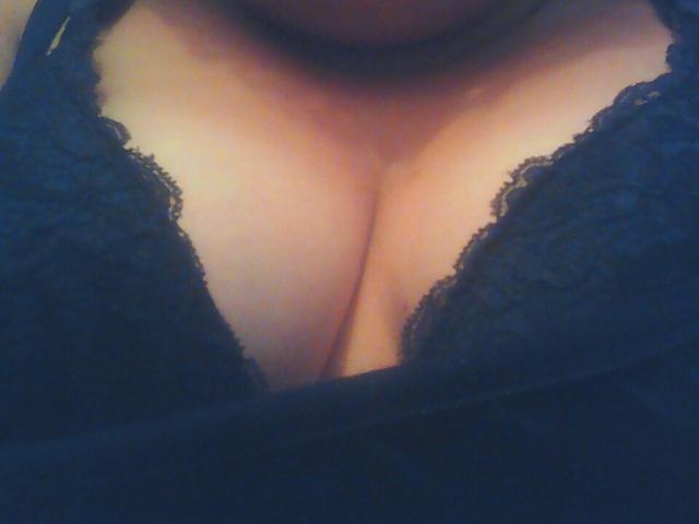 Close-up of several light brown paper lanterns, each with a small white star, evenly spaced in a row. Soft, even lighting. Simple, minimalistic composition. BonnieAngel not visible.