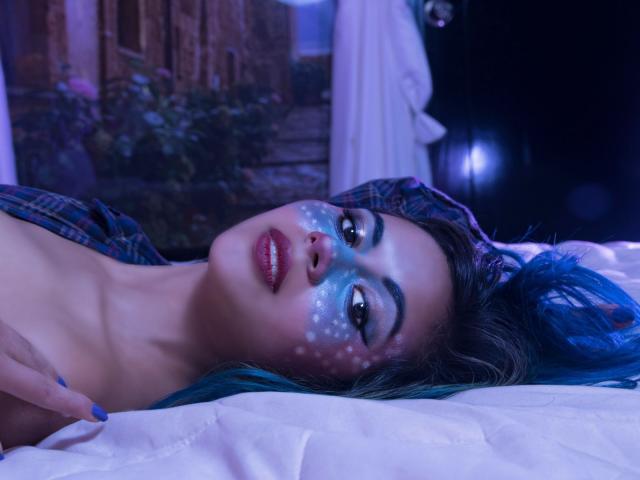 Graphic illustration of five identical, stylized, white, shield-like symbols with a central, red, diamond-shaped emblem. Symbols are evenly spaced, creating a symmetrical pattern. Clean, minimalistic design.