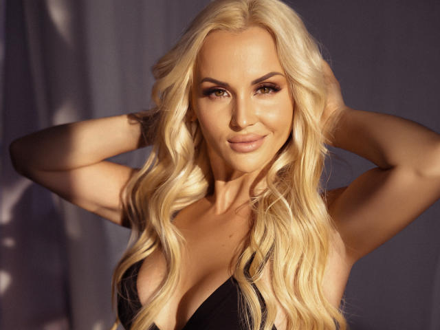 Digital art of a stylized letter "E" in the center. Soft, gradient colors with light shading. Simple, minimalistic design. Klubnika's not in the image. Clean, modern typography style.