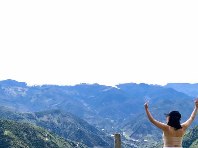 A digital illustration of a Japanese-style paper fan with bold, flat colors. The fan is centered with a simple design, featuring dark blue and white with a red accent.
