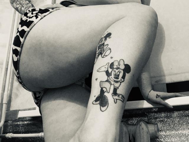 Digital illustration of a flat, minimalist style. Central white letter "A" with black outline. Light brown background. Simple, clean lines. Bold, solid colors. No additional objects or textures.