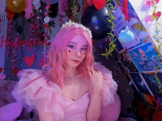 MissAstravert with pink hair, flower crown, pink dress, heart makeup, holding her hair, soft smile, pink tulle, black balloon, colorful decorations, cute, sexy, pastel colors, purple lighting.