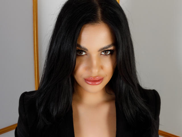 A flat, minimalist design of a lit, red flame in the center, surrounded by a white, rectangular border. The flame is stylized and simple, with soft, even lighting.