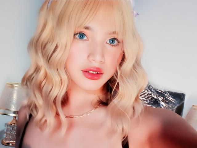 Close-up of a detailed, flat-style emblem with a red and white color scheme. Central red emblem with a black emblem below, surrounded by white space. Minimalist design.