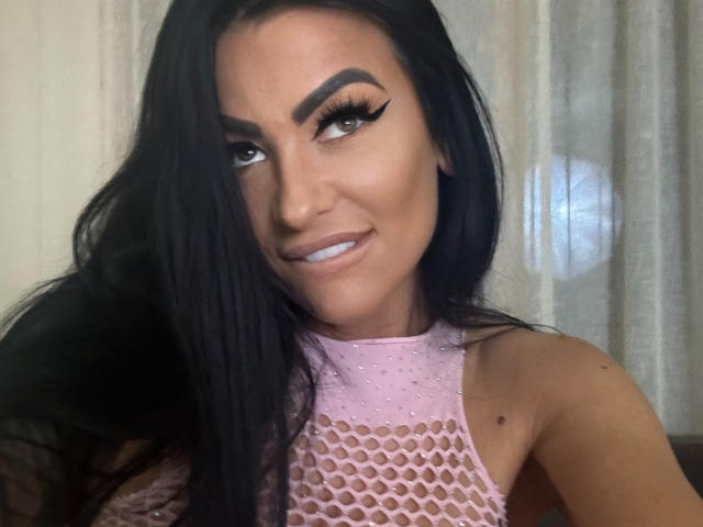 Digital illustration of five identical, slightly faded, white, stylized letter "V" shapes. Soft, pastel colors, centered in a grid-like pattern. Minimalistic, flat design. No additional elements or textures.