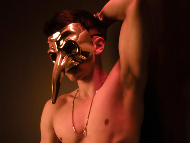 A flat, minimalist design with a red, stylized letter "L" in the center. The letter has a small white flame-like shape at the bottom. Solid colors, no gradients.