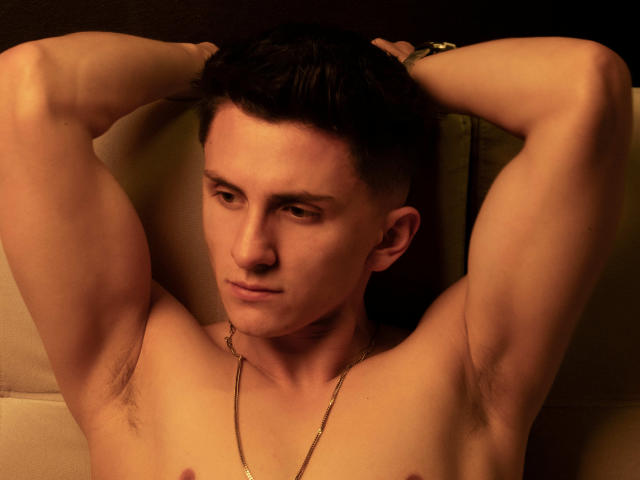 Close-up of a stylized, flat, 3D, vintage-style letter "E" in bold, orange-yellow color. Simple, solid fill with no shadows or gradients. Clean, geometric lines. Minimalist design.