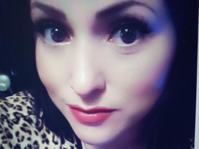 Digital art of five stylized, flat, white, and red letter "A" shapes in a vertical line. Red "A" has a small black dot in the upper right. Minimalist, geometric.