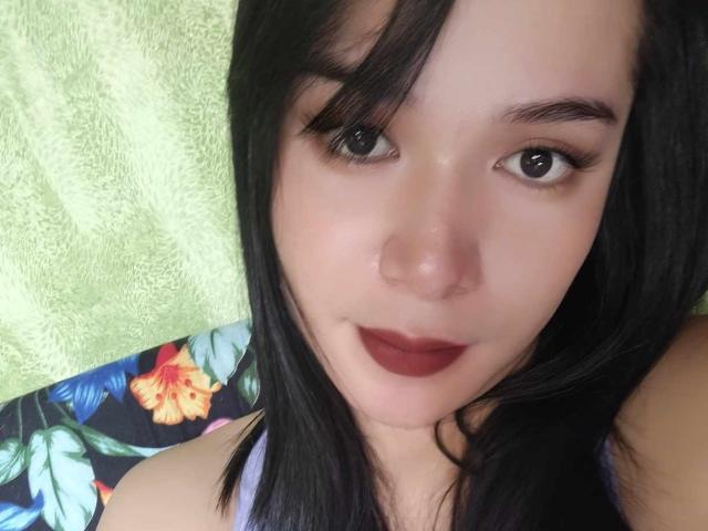 Minimalist art piece showing multiple beige, flat, three-dimensional letters "A" stacked vertically. Letters have a subtle, textured surface with slight shadows, creating a sense of depth. Simple, modern design.