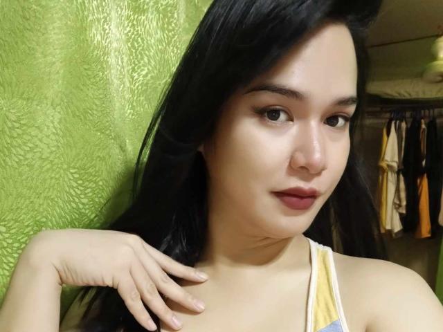 Flat, minimalist design with a large, bold, red letter "B" in the center. Light green textured pattern in the bottom left corner. Simple, clean lines. No additional objects.