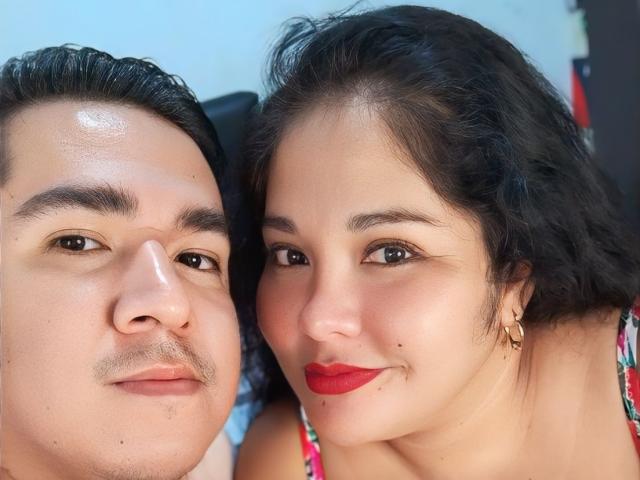 JexyCouple has a chubby, shiny Asian face with a small mustache, and JexyCouple's cute, curvy Asian face with red lipstick, black curly hair, and small earrings.