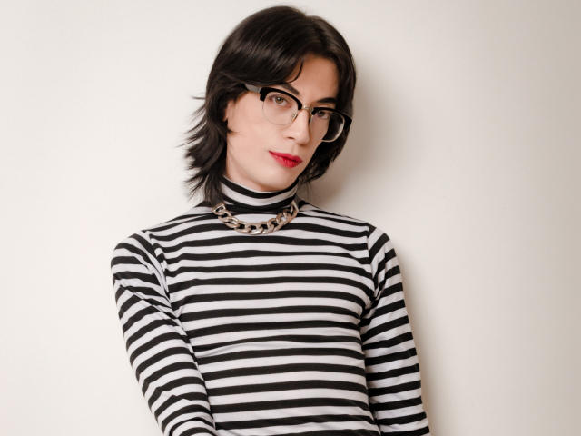 A minimalist digital illustration of a large, stylized "V" shape in black and red. The design is simple with flat colors and clean lines. MilarHole's logo is in the center.