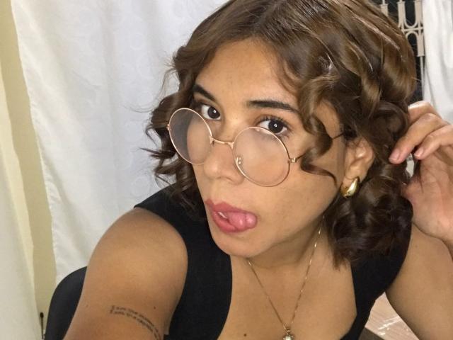 A minimalist, flat-design illustration of a large, stylized letter "L" in the center, with subtle, warm gradients and soft shadows. Simple, bold lines define the letter.