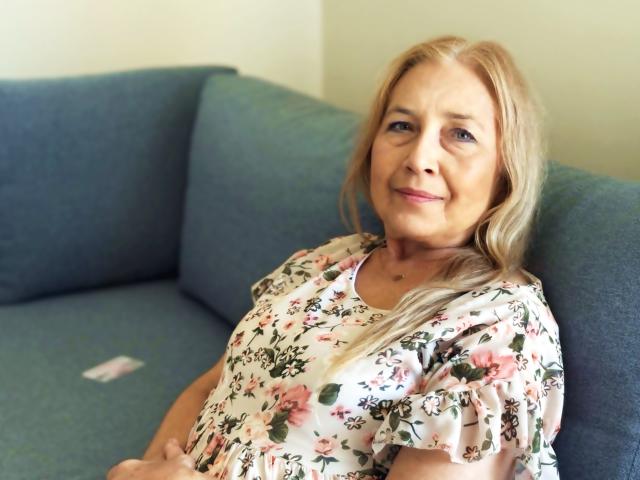 Three large, stylized paper lanterns in a row, each with a different design. The lanterns are positioned centrally with a slight overlap. The bottom lantern has a Korean symbol.