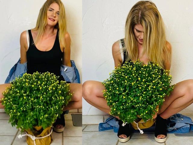 Tara-Secret-hot with blonde hair, black tank top, and denim jacket, squatting, holding a green potted plant with yellow flowers, wearing black heels, smiling in two side-by-side photos.