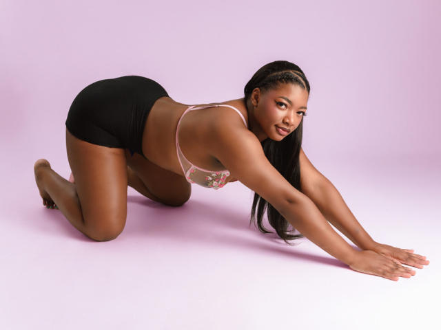 Digital art of a classic-style letter "L" in bold, red, and black. Flat, symmetrical design with smooth gradients and sharp edges. Simple, minimalist composition. Modern, iconic typography.