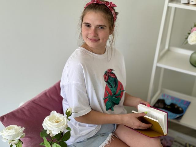 Five ornate, partially translucent, vertical flags with red and white accents. Flags are positioned in a slight diagonal from left to right. Simple, clean design. Red accents in lower flags.
