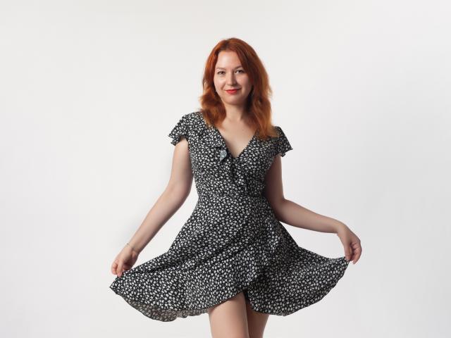 Digital illustration of a Korean-style flag with a black and white patterned design on a red background, featuring a bold red flame at the top center. Simple, bold colors.