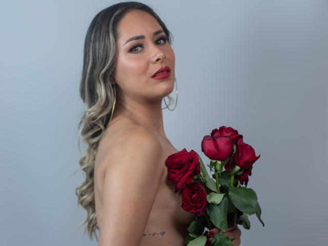 Digital art of multiple red, white, and black 3D letter "L" shapes stacked vertically. Soft shadows, gradient colors, simple geometric forms. Clean, minimalistic style. Bold, contrasting colors.