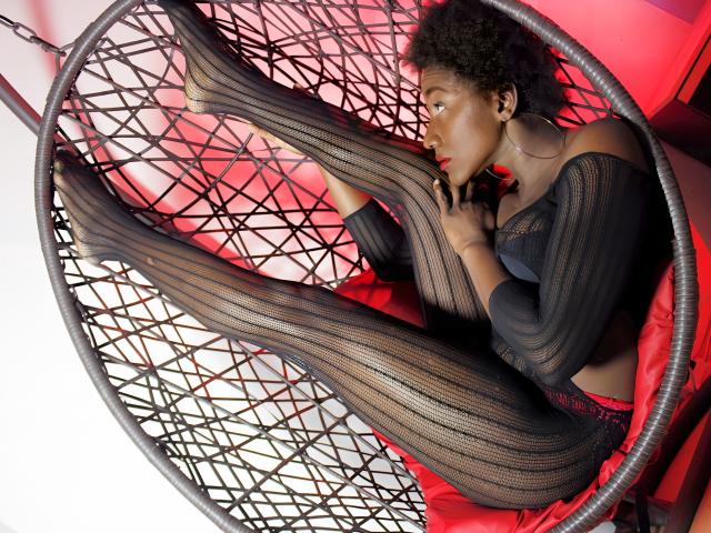 Digital art of a Korean flag with red and white colors, featuring traditional Korean patterns in black. Bold, geometric design with strong lines and minimalistic style. Red symbol in bottom right.