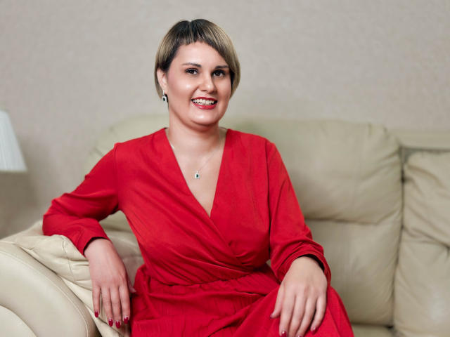 Multiple red and white French flags with a black rosette in the upper left corner. Flags are positioned in a vertical line, slightly overlapping. Simple, bold colors.