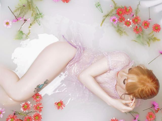 Close-up of a European-style flag with red and green details, featuring bold, flat colors and simple design. SadieAntolini's flag is centered with red accents on the bottom left.