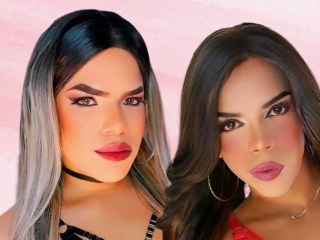 MinaYCelesteMistress has long black and gray hair, red lipstick, black choker, and hoop earrings, with both her and another MinaYCelesteMistress showing off their pretty faces.