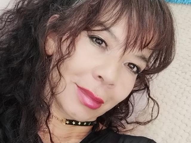 Close-up of a minimalist, modern-style emblem featuring a bold, sans-serif "B" in the center. The emblem uses a gradient from dark to light brown. Simple, clean lines.