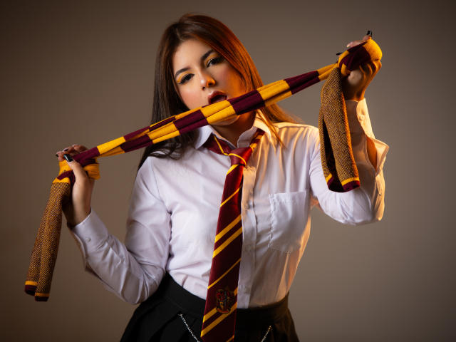 Digital art of a stylized, bold, flat-design banner with a large, white, angular letter "P" in the center, surrounded by thin, orange accents. Minimalistic, modern aesthetic.