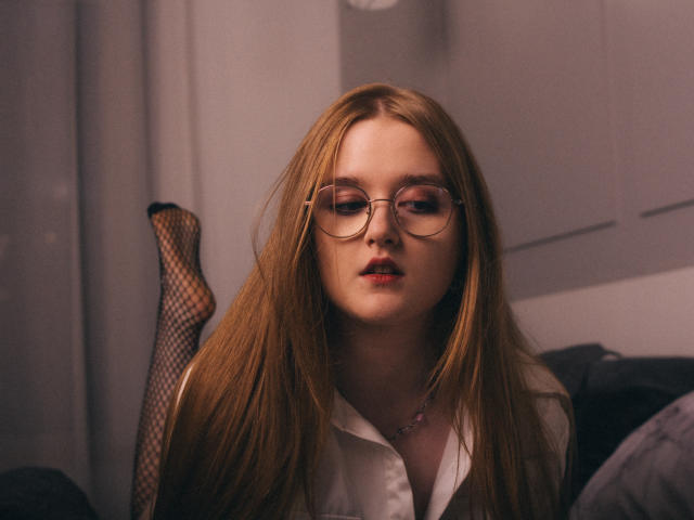 Digital illustration of five large, flat, vertical, red and white letters forming a grid-like pattern. Letters are evenly spaced, with bold, solid fills and clean, sharp edges.