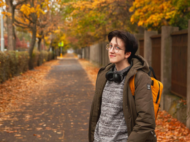 Digital illustration of a bold, geometric-style letter "V" in black and orange. Simple, flat colors. Sharp, clean lines. Centered, with orange filling the upper half and black the lower.