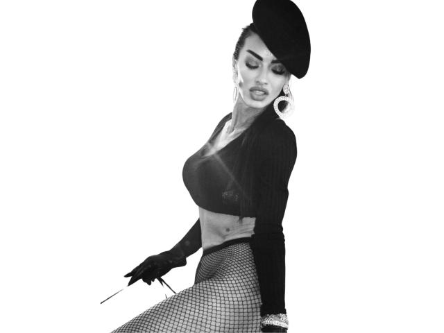 IamTheCountess has big tits, wears a black beret, long gloves, fishnet pants, and a cropped top, holding a cigarette, looking down with closed eyes, in black-and-white.