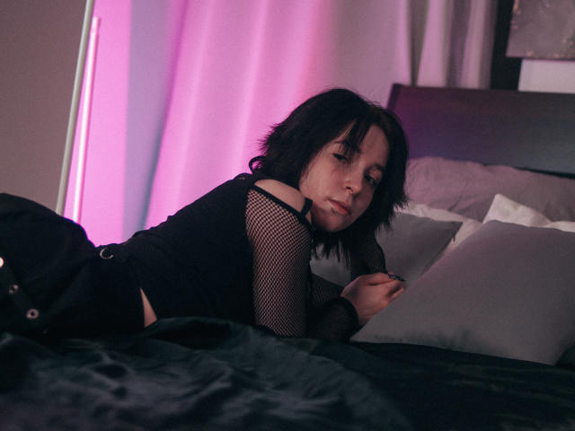 Digital art of a red and white Scandinavian-style shield emblem with a bold, flat design. Simple, solid colors. Central emblem, symmetrical layout. Clean lines, minimalistic. No additional elements.