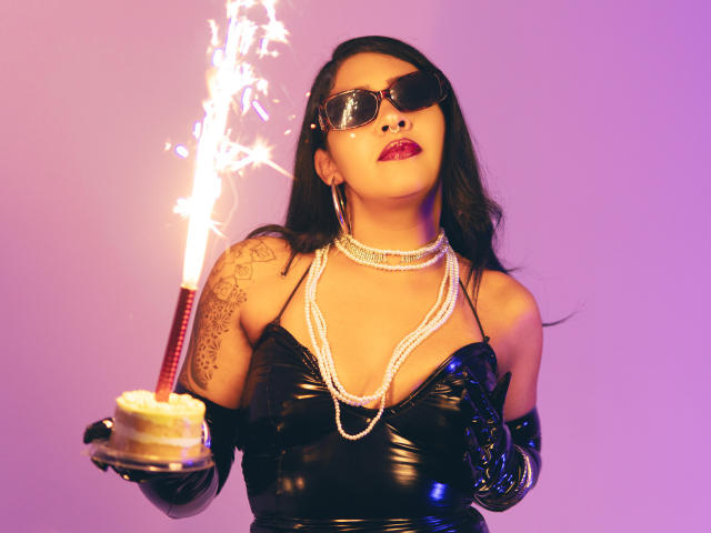 A close-up of a vintage-style letterhead featuring a bold, black, and red logo with a crest-like design. The logo is centered with a subtle gradient background.