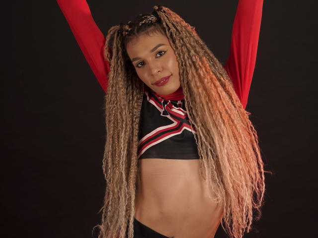 Red and white heraldic design with a central emblem. Bold, flat colors. Simple, clean lines. Traditional, slightly ornate style. Emblem in center, slightly raised. Red and white contrast.