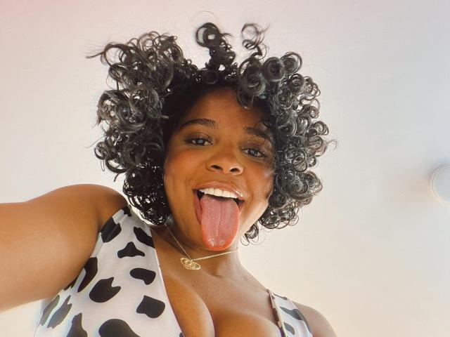 Flat, stylized logo with a large, bold "L" in the center. Dark, ornate patterns surround the "L". The logo uses a mix of black and red. Simple, modern design.