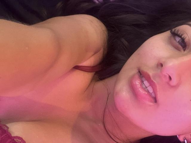 Flat, minimalist design with bold, dark letters. Centered, large, light-colored letters. Simple, clean composition. Letters have slight shadowing, creating subtle depth. Light source from top. No additional elements.