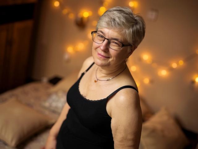 Stylized, minimalist art with bold, flat colors. Center features a large, black, and orange letter "L" design. Light source from top right. Simple, clean lines, no gradients.