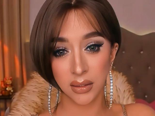 Digital art of a minimalist style. Features a flat, bold design with a large, centered red letter "R". Soft, gradient shading. Simple, clean lines. No textures or intricate details.