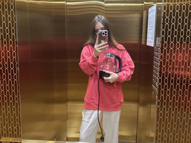 Digital art of a Korean-style flag with a bold red and white trapezoid in the center, flanked by black Korean letters on both sides. Simple, flat colors.