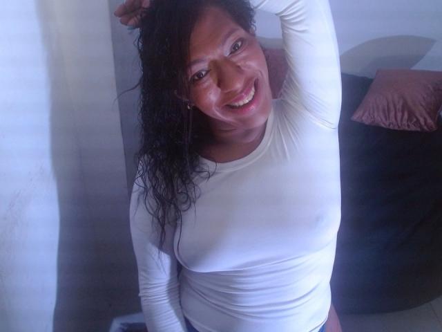 Flat, stylized, red and white coat of arms with a bold, central design. Simple, symmetrical layout. Red accents on white background. Clean, minimalist style. No additional objects or textures.