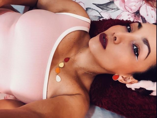 Digital art of a minimalist style with a large, bold letter "C" in the center. Light pink and white background with subtle striped pattern. Simple, clean lines. AmberDemons not present.