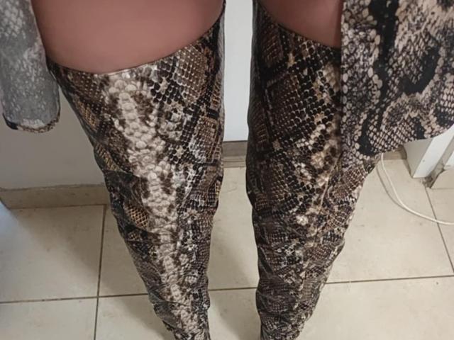 KimStar's legs in snake-skin pattern, thigh-high boots, showing a realistic brown and black snake texture. Boobs not visible, only legs and boots.
