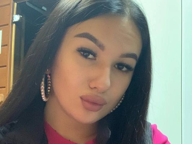 Stylized painting of a large, dark red, flat design letter "A" in the center. Soft, gradient edges with subtle shadows. Minimalistic, bold color. NettyLizette's name not visible. Modern, abstract style.