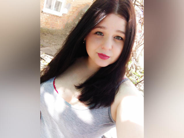 Flinty-style propaganda poster with bold red and white colors, featuring a large, stylized letter "L" in the center. Simple, geometric shapes dominate the design. EricaLaLovely not visible.