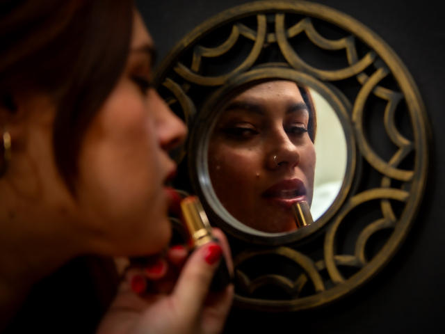 Digital art of five red and white Scandinavian-style flags, evenly spaced, with subtle shadows and soft gradients. Flags have simple, bold shapes and a minimalist aesthetic.