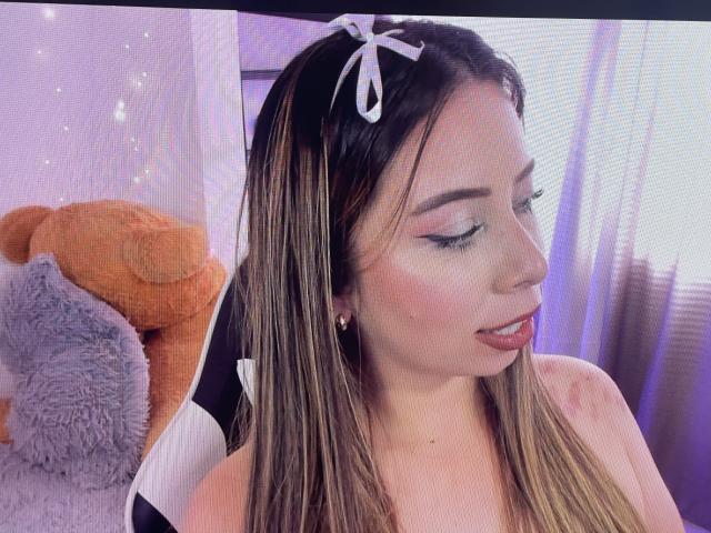 Digital illustration of a minimalist design with a large, stylized letter "B" in the center, surrounded by soft, gradient colors. Simple, clean lines. No additional objects or textures.