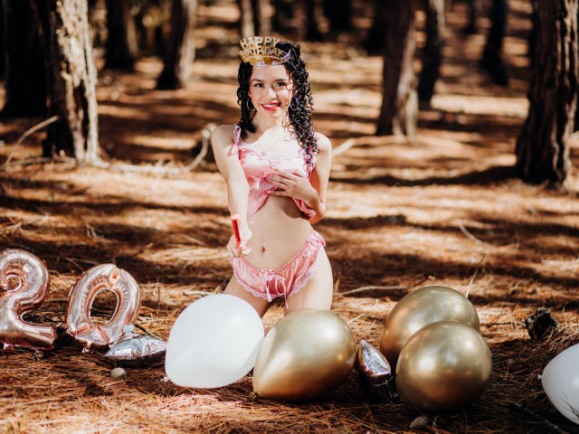 Digital art of a modern, minimalist design. Centered large, bold letters with a subtle gradient from dark to light. Red "R" in lower left, white "V" in lower right.